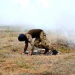 soldado en el campo de batalla